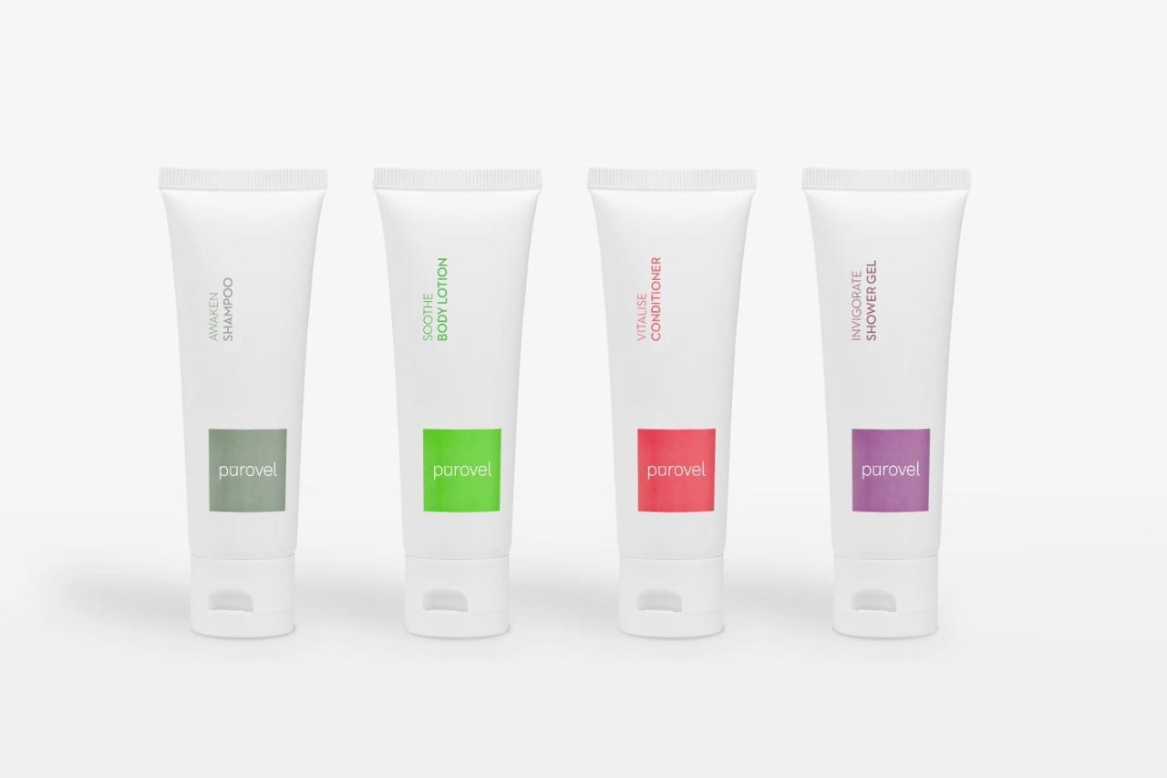 Paradox Singapore Merchant Court At Clarke Quay Екстериор снимка The photo shows four tubes of cream or lotion, each with a distinct color label. The tubes are all white with a flip-top cap at the bottom. From left to right, the first tube has a green label, the second a darker green, the third a red label, and th